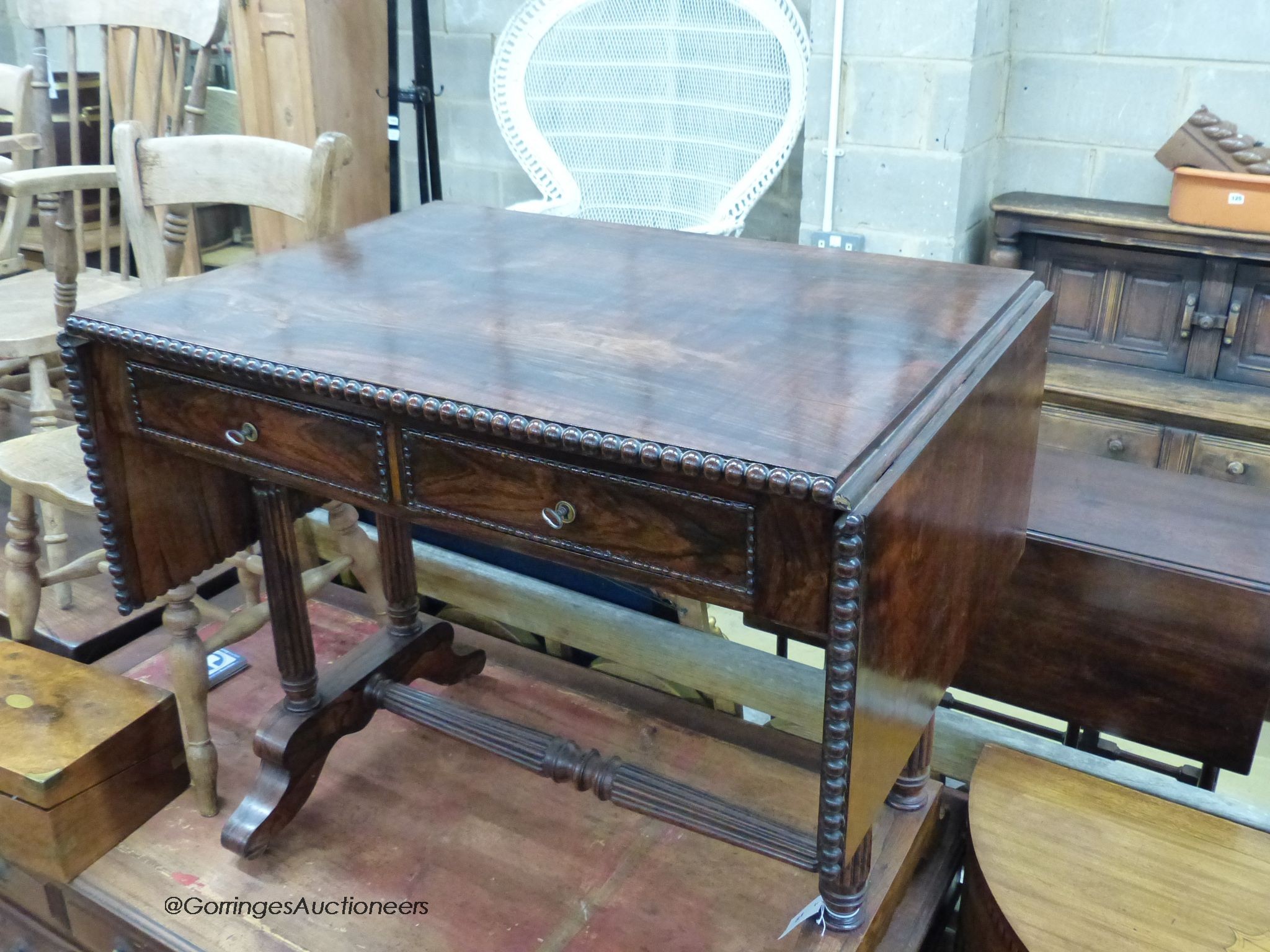 A 19th century French rosewood sofa table, width 86cm, depth 60cm, height 74cm